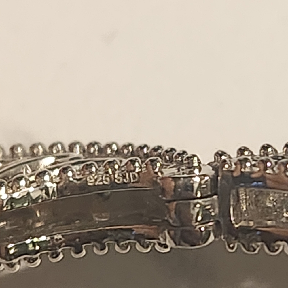 Elegant Sterling Silver Huggie Earrings - Picture 5 of 5